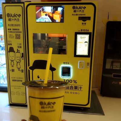 ORGの新しい絞られたオレンジ ジュース メーカーのホテルの新鮮な果物ジュースの自動販売機