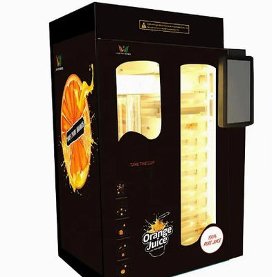 モールのビルのアクセプターとの自動フルーツ ジュースの自動販売機の自己サービス