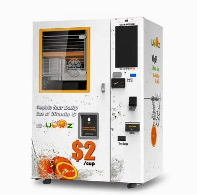 モールのビルのアクセプターとの自動フルーツ ジュースの自動販売機の自己サービス